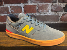 Load image into Gallery viewer, NB Numeric Foy 306 cup blue/yellow